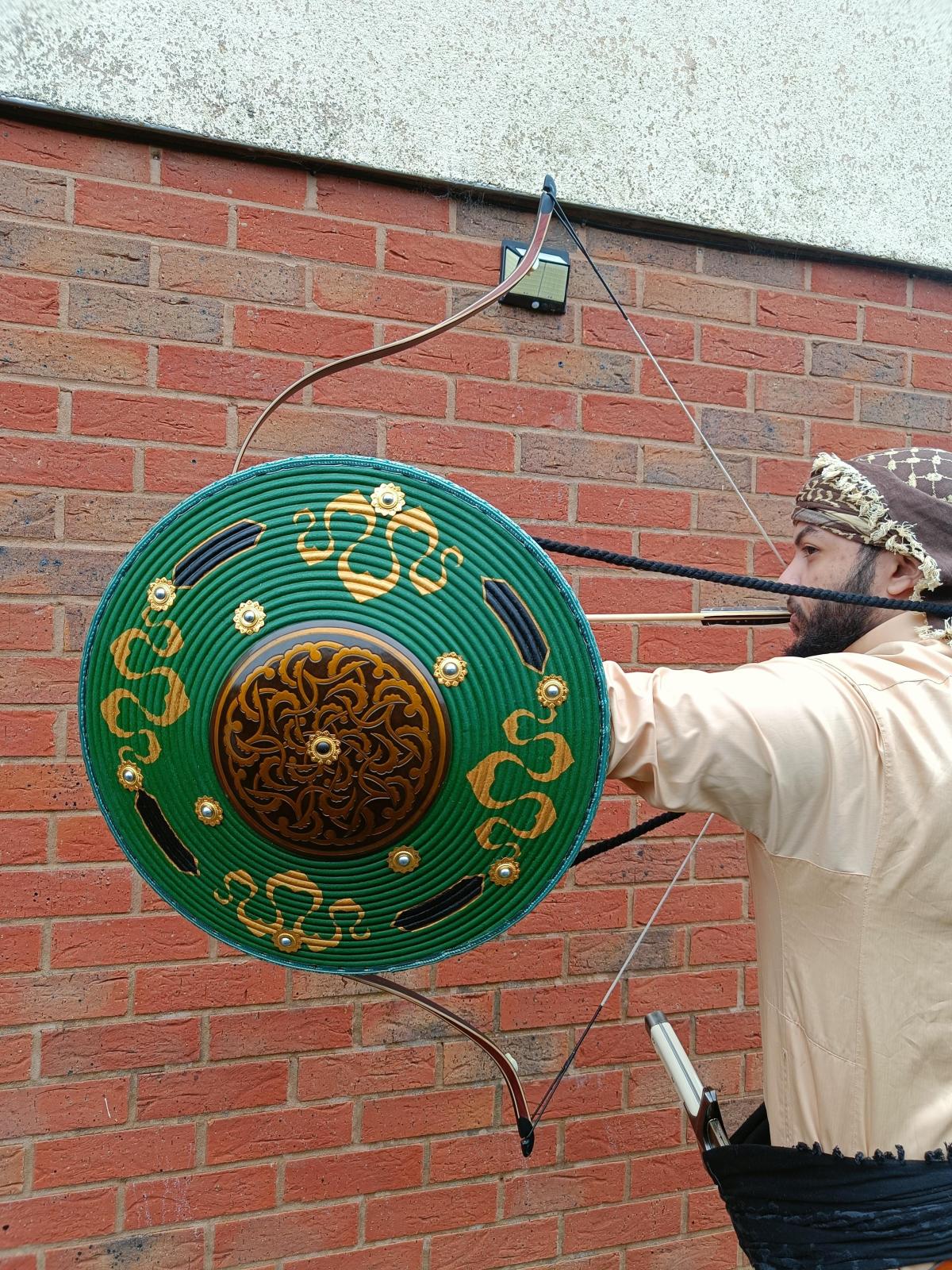 archery-with-a-kalkan-shield-v0-az9gcmo8lslc1 (1).jpg