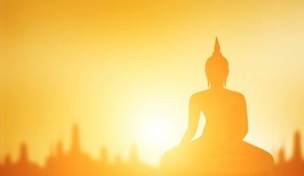 buddha-statue-silhouette-on-golden-260nw-1414656560.jpg
